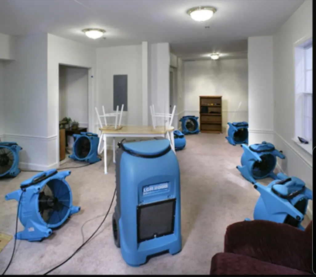 Air movers and dehumidifier setup for Water Damage Restoration in Fort Lewis